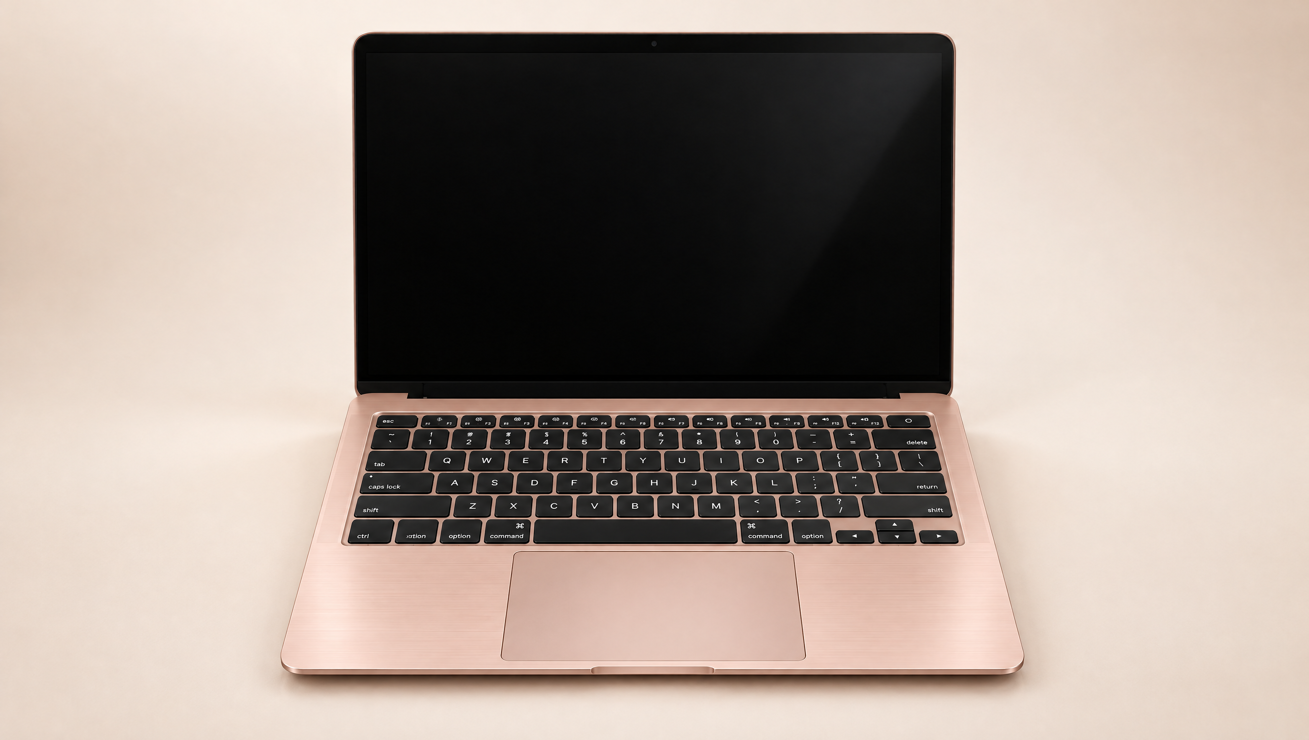 A rose-gold laptop, open, showing SNE Pulse